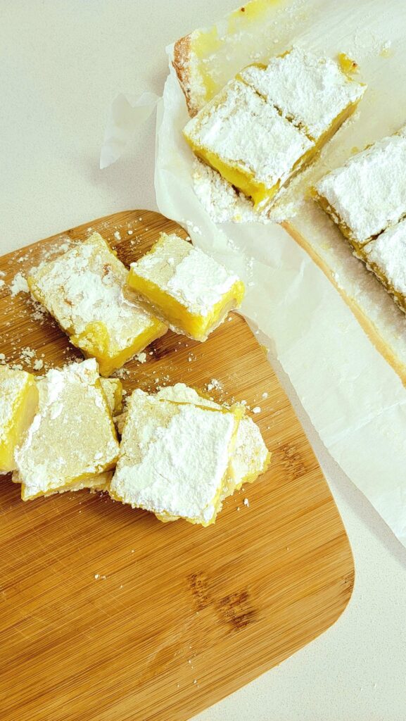 lemon bars sprinkled with powdered sugar for extra sweetness