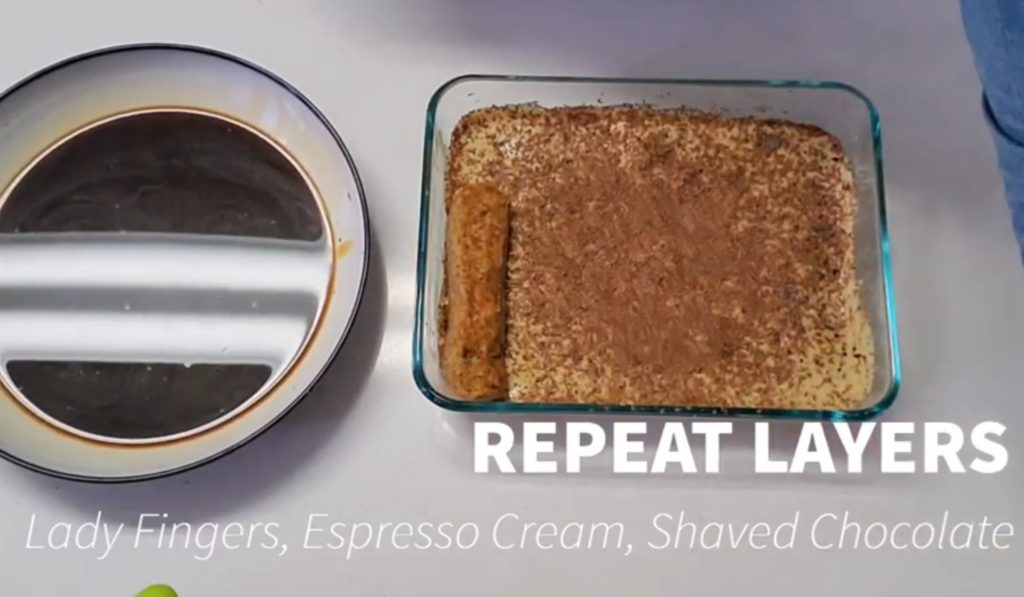 The layers for a homemade no bake tiramisu start with espresso soaked ladyfingers, followed by cream mixture and shaved chocolate. 
